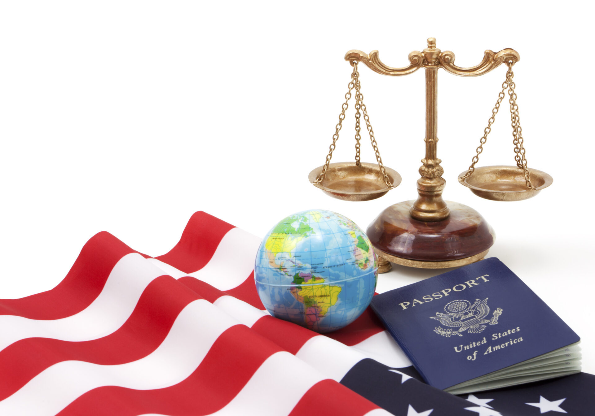 "Immigration concept with passport, globe, United States flag and scales of justice."